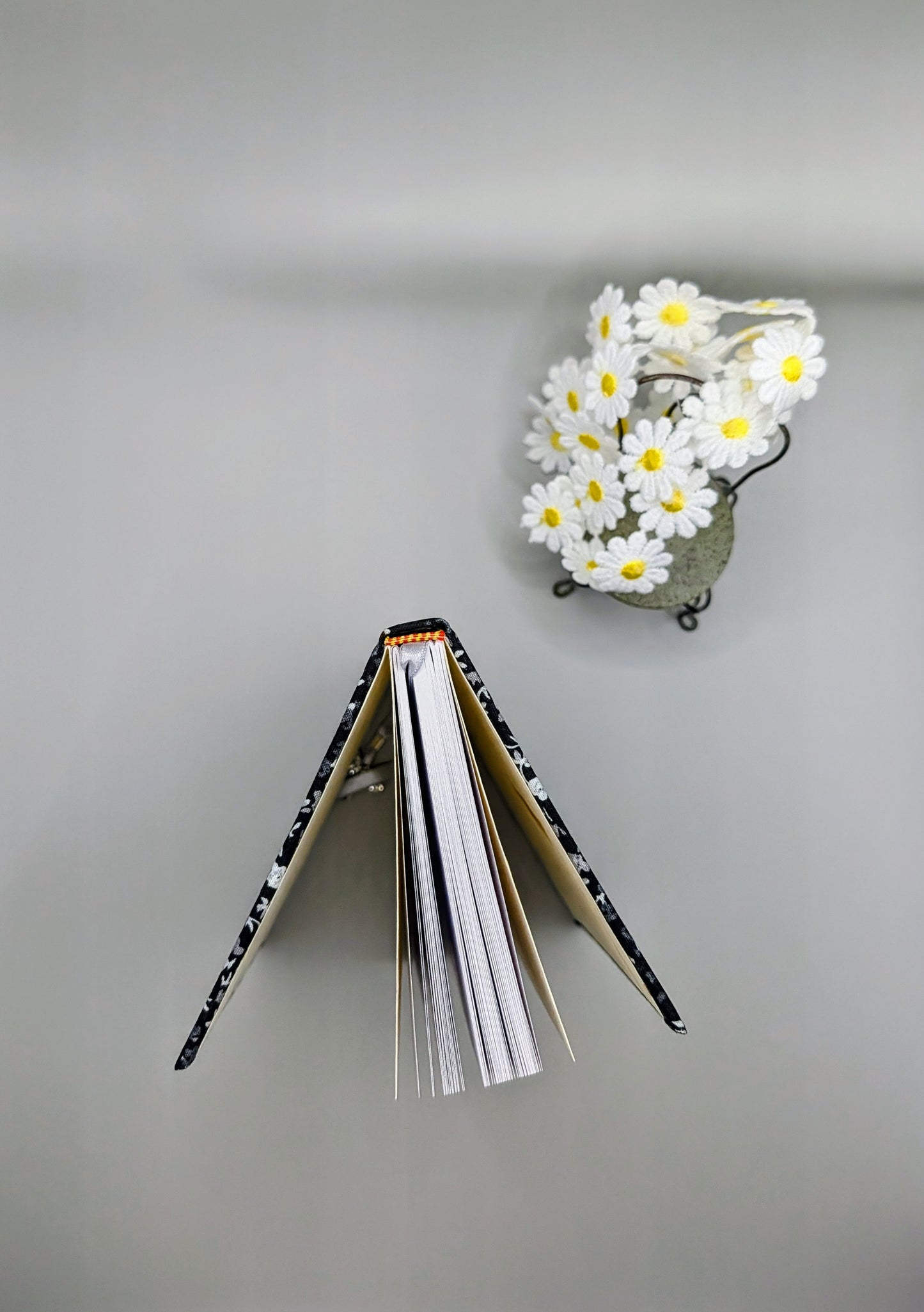 Tiny Black and Gray Flowers on black background with a little bunny head print as embellishment - Handmade Fabric Journal