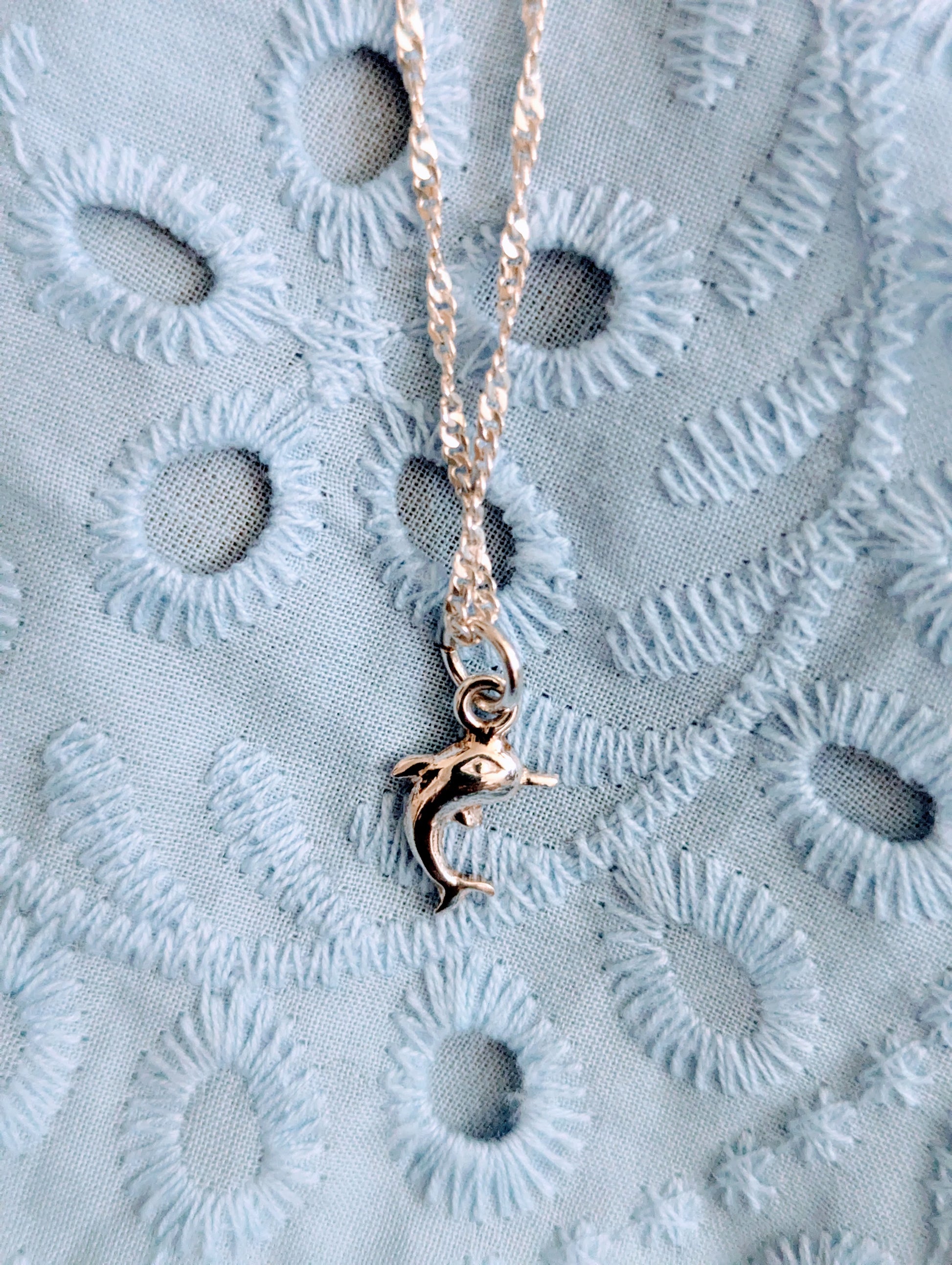 Peruvian Silver 950  gold necklace with a dolphin pendant. Chain is absolutely beautiful.