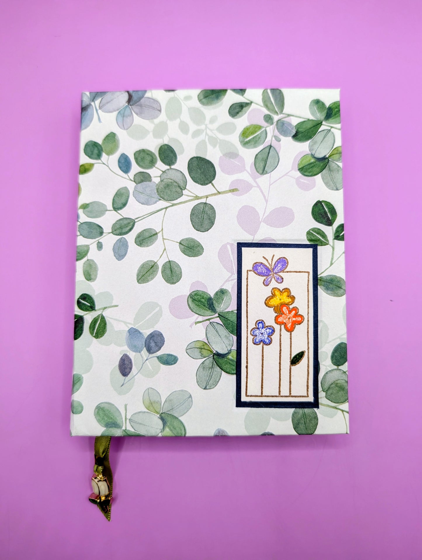 Green and Lavender Leaves with an image of flowers and butterfly as embellishment - Handmade Hardcover Journal