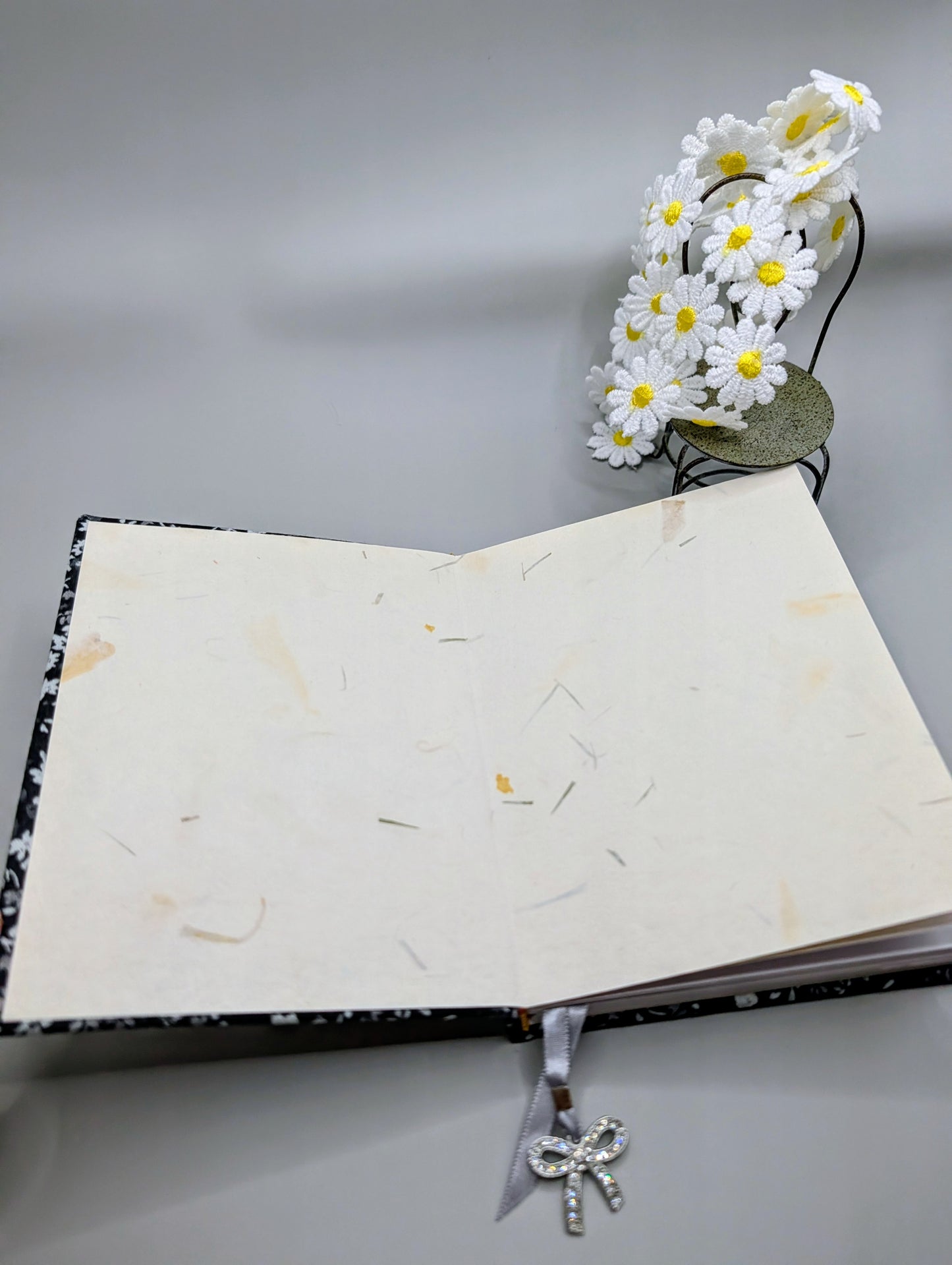 Tiny Black and Gray Flowers on black background with a little bunny head print as embellishment - Handmade Fabric Journal