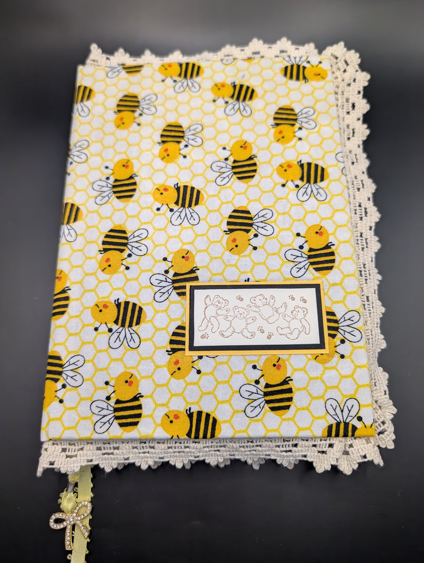 Handmade fabric and lace journal with honeybee pattern for journaling and scrapbooking.